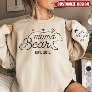 This Mama Bear Wears Her Heart On Her Sleeve - Family Personalized Unisex Sweatshirt With Design On Sleeve